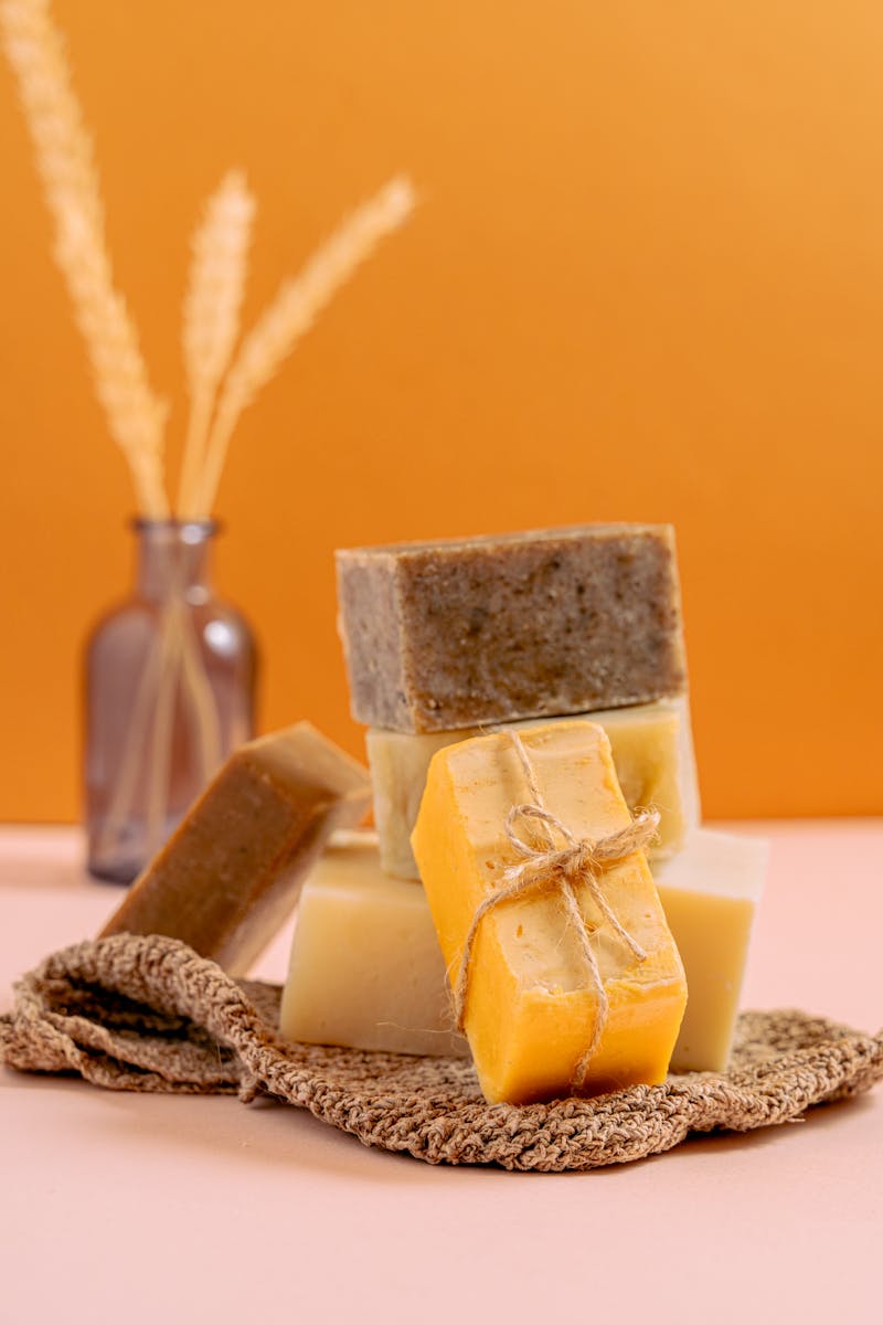 Stack of organic handmade soap bars with a minimalist aesthetic, perfect for bath routines.